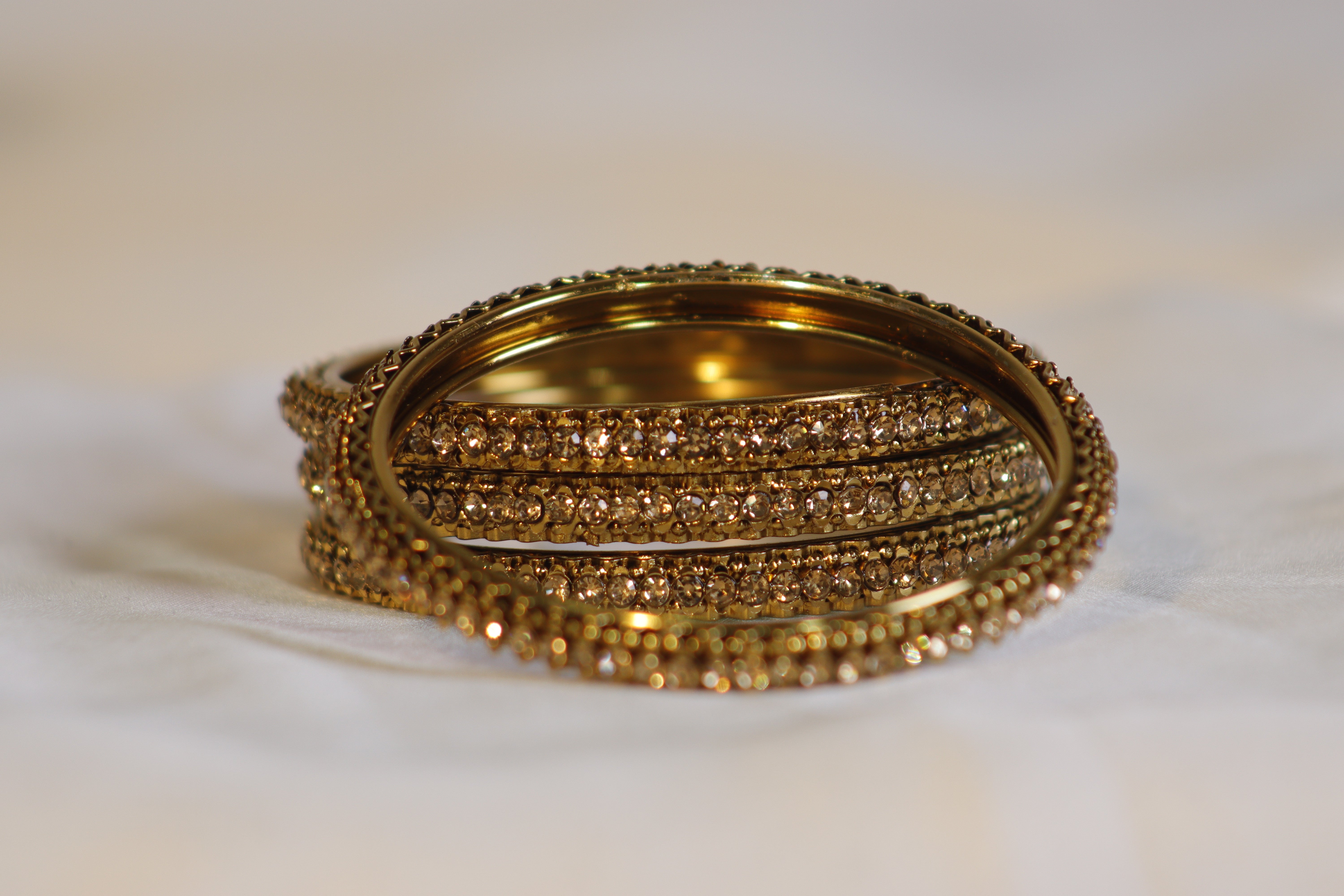 Golden Kara Set of 4 with Embedded Golden Stones – Classic & Elegant Design