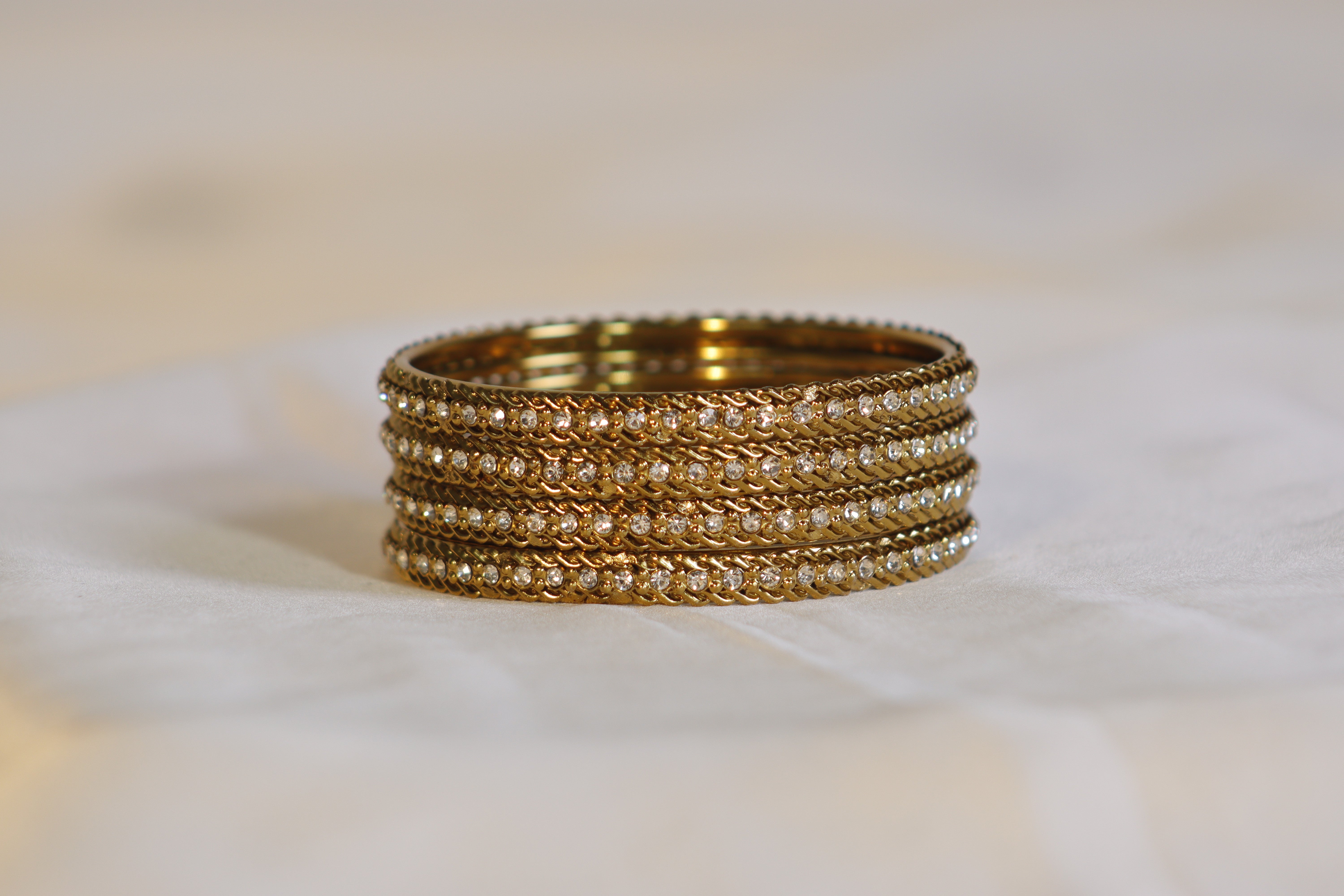 Golden Kara Bangles with White Stones – Traditional Set of 4