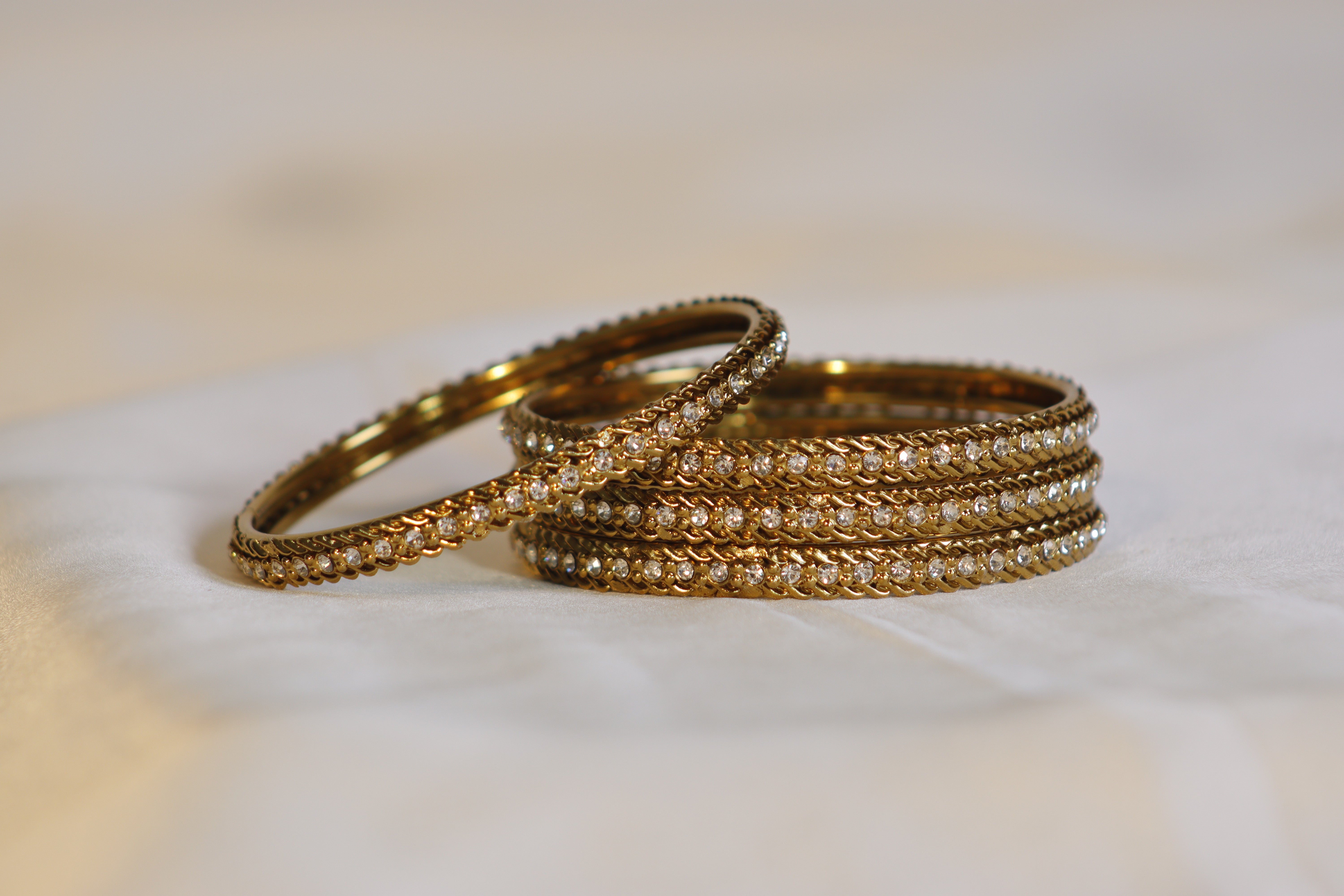Golden Kara Bangles with White Stones – Traditional Set of 4