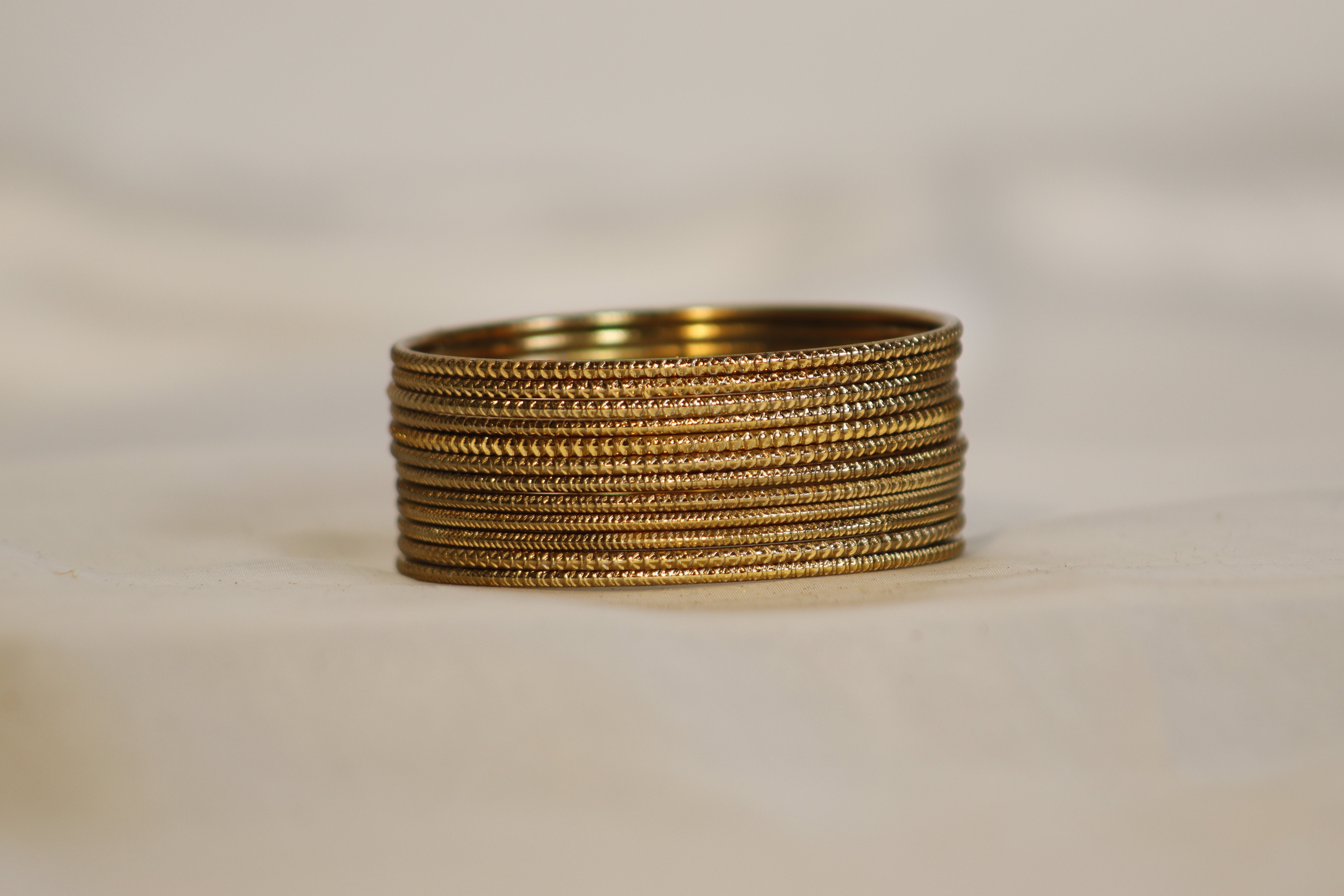 Classic Oval Pattern Metal Bangles – Set of 12 | Traditional Look | Available in 2 Colours