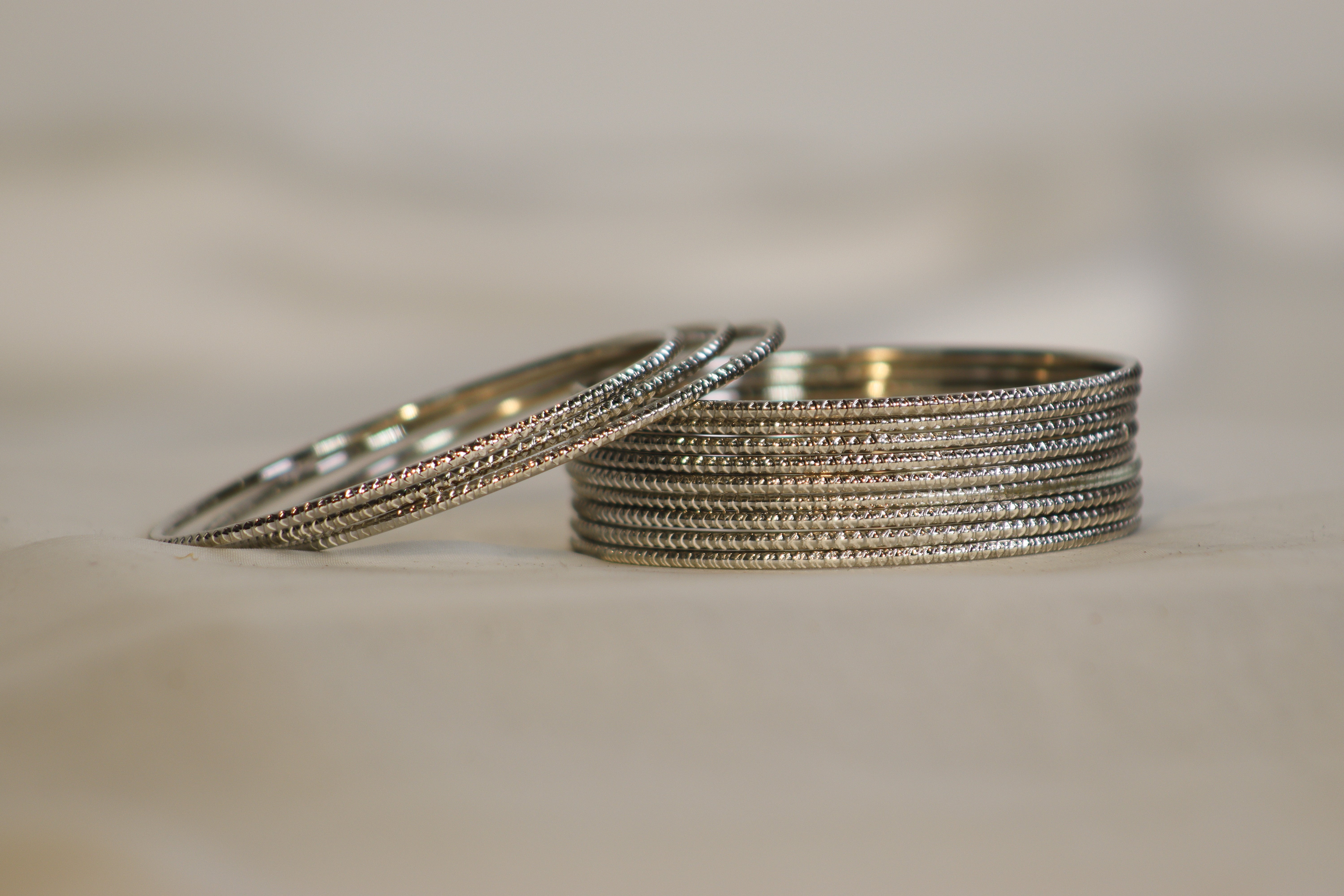 Classic Oval Pattern Metal Bangles – Set of 12 | Traditional Look | Available in 2 Colours