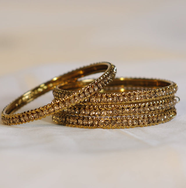 Metal Bangles in Golden with stone – Set of 4