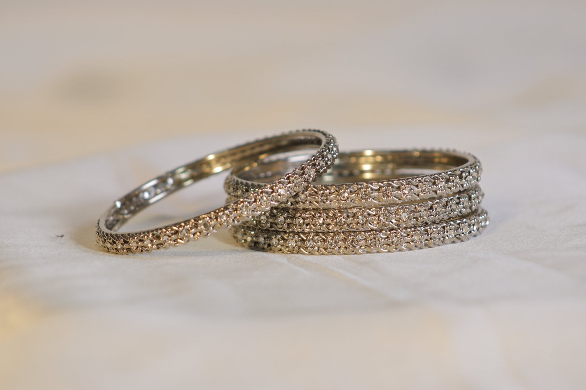 Metal Bangles in Silver with White Stone