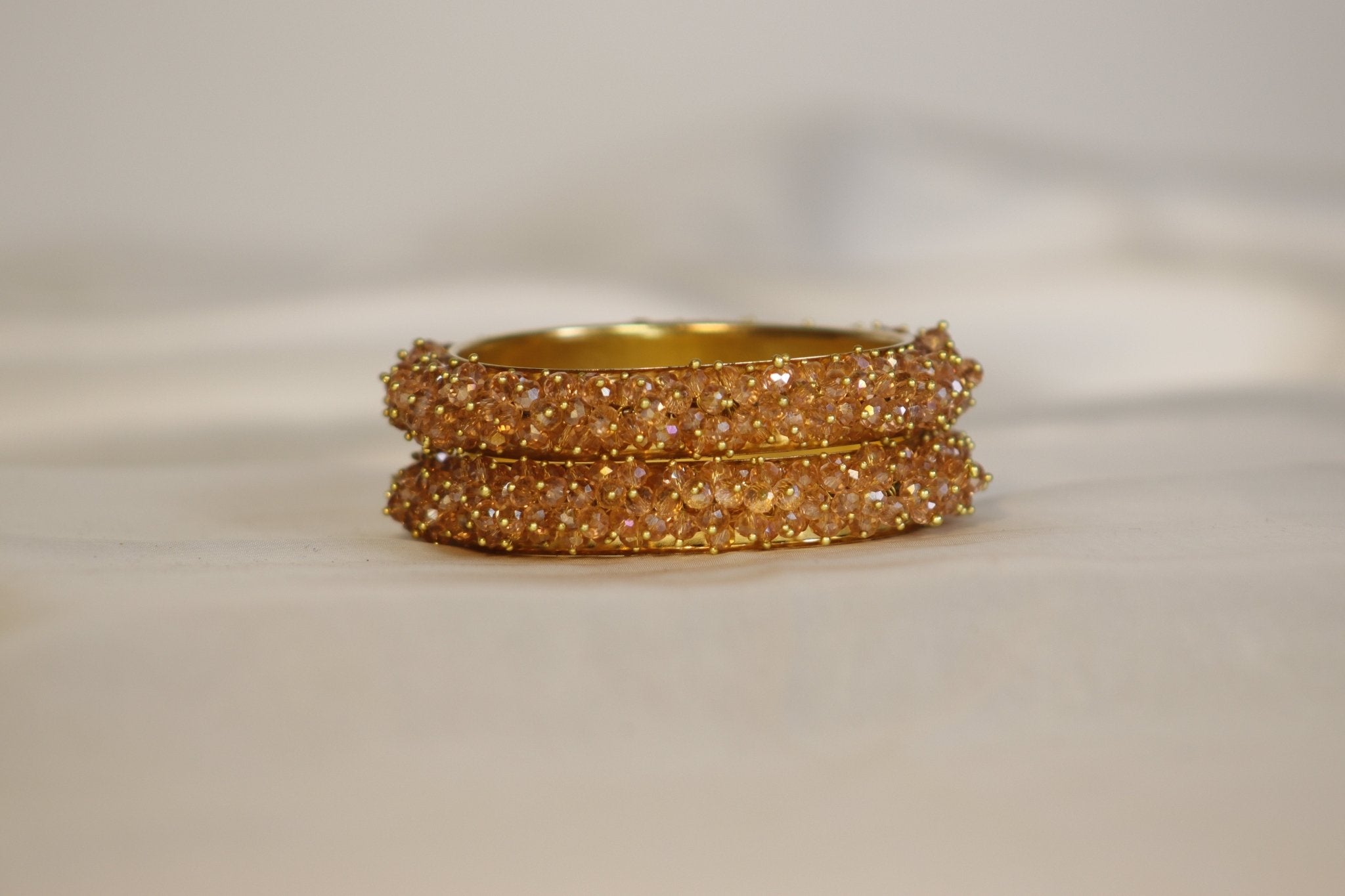 Metal Bangles with Crystal Pair in Gold