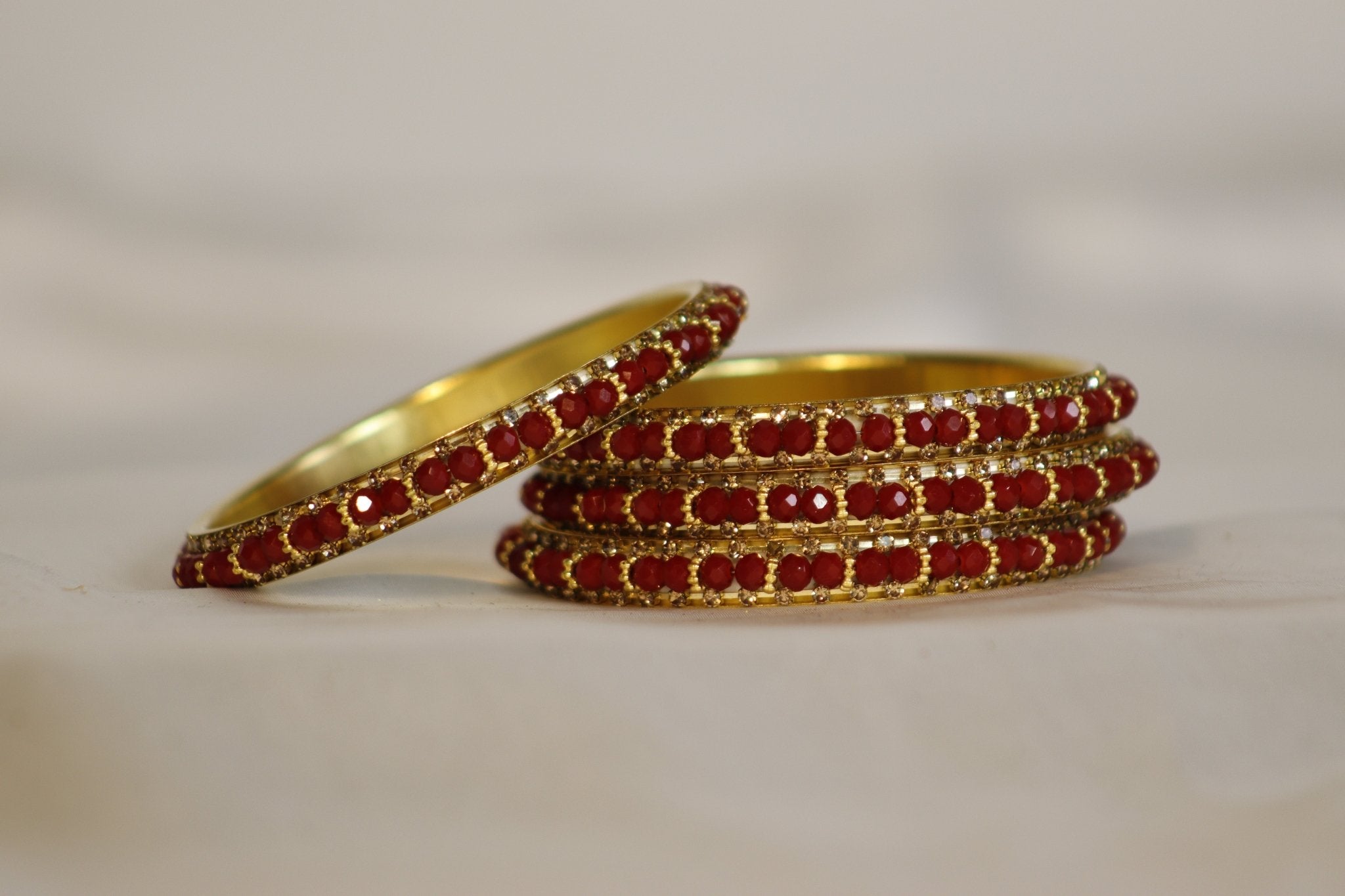 Metal Bangles with Light Red Stones – Set of 4