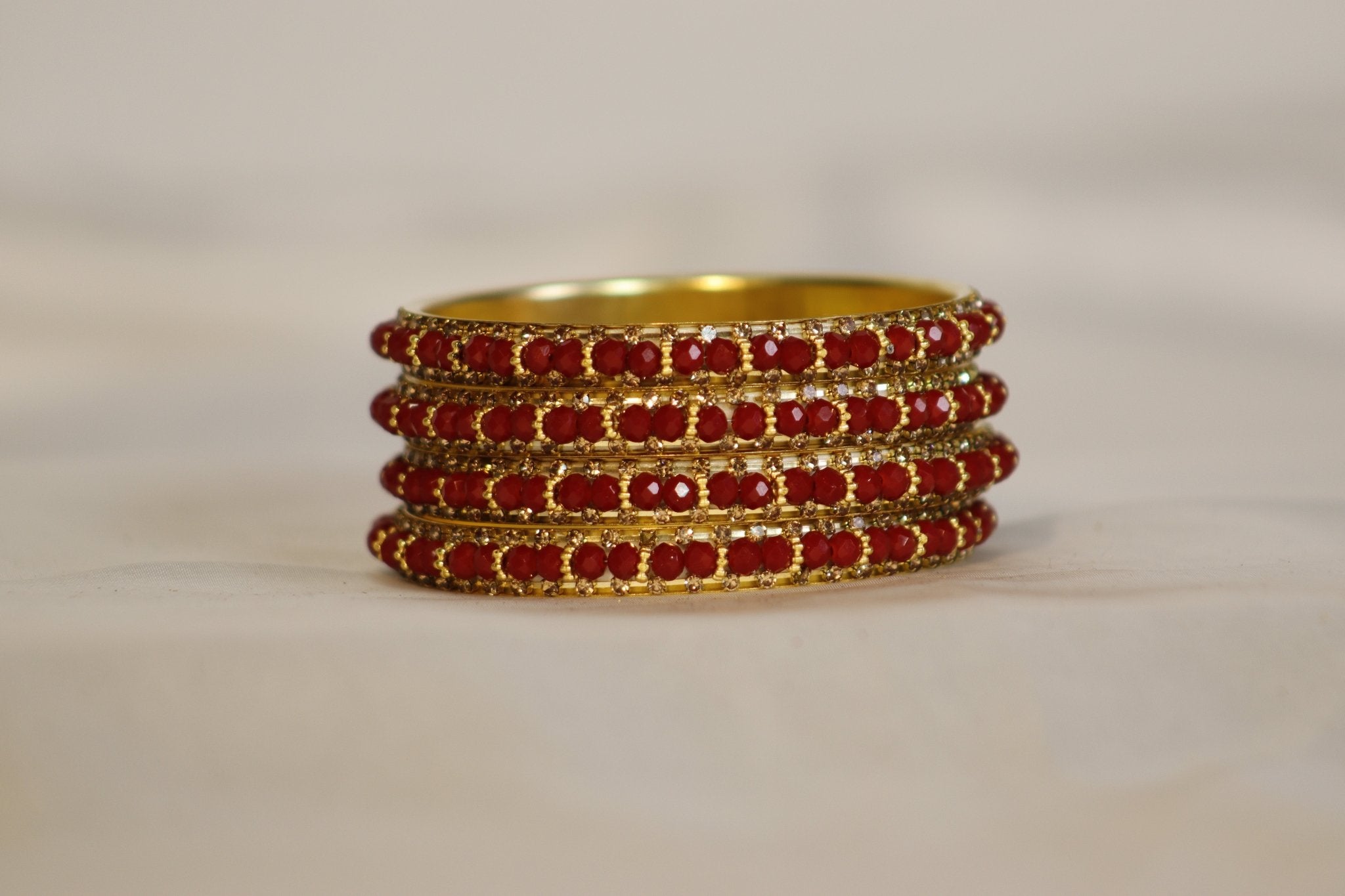 Metal Bangles with Light Red Stones – Set of 4