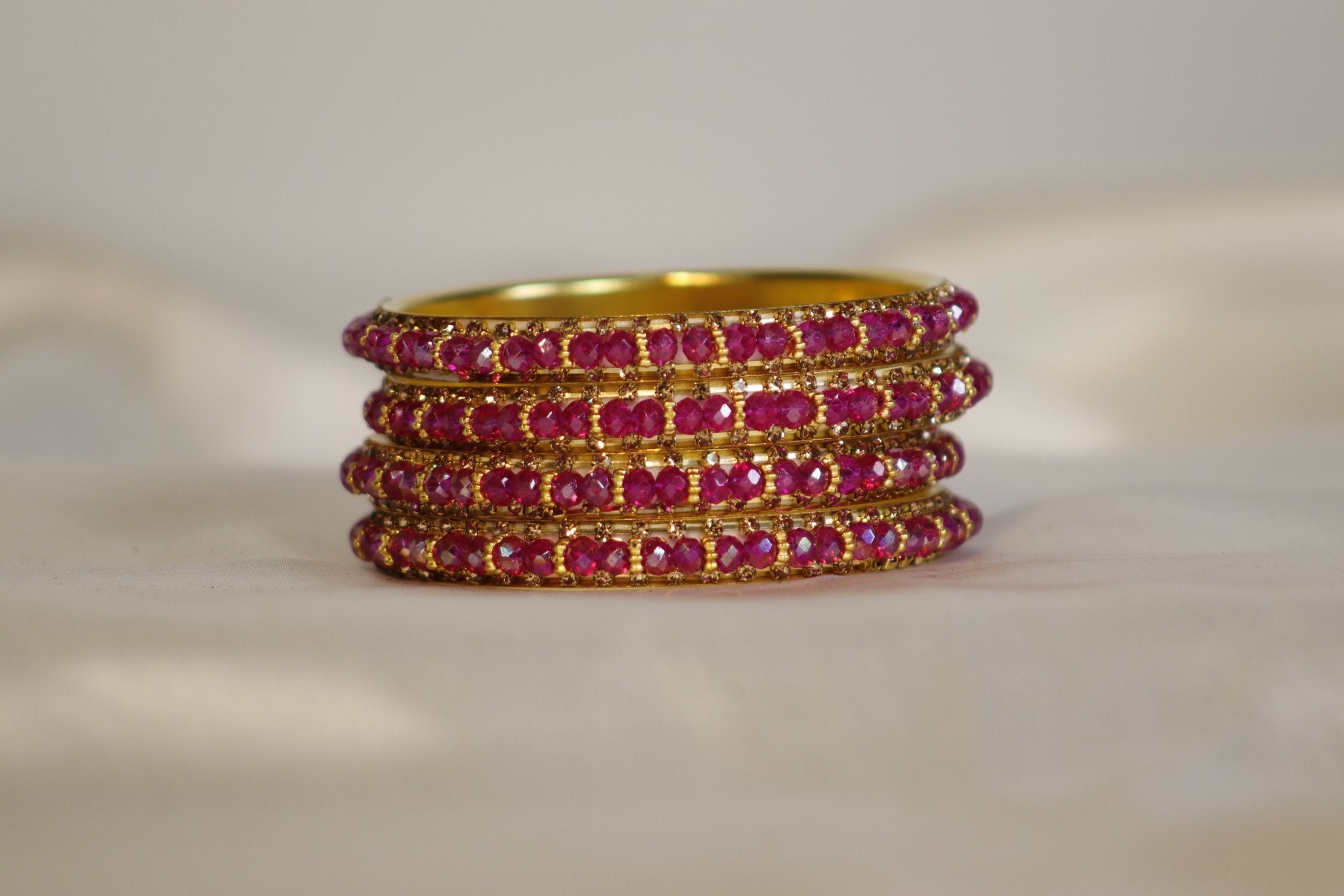 Metal Bangles with Pink Stones – Set of 4